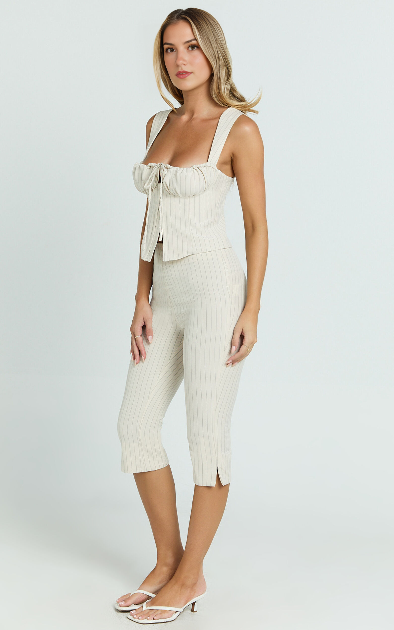 Susannah Cream Pinstripe Split-Hem Cropped Trousers – Tailored Elegance in Motion
